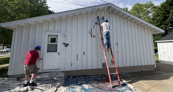 HD Painting crew working on exterior painting project